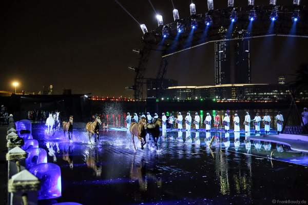 Horses galloping across the submerged stage at UAE 44th National Day 2015 in Dubai, a performance trained from Bedouin horseman - Ali Al Ameri - the horsemaster