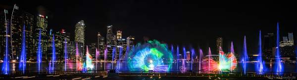 New light and water show SPECTRA with dancing water fountains, water screens and laser at Marina Bay Sands Singapore