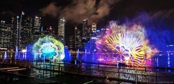 New light and water show SPECTRA with dancing water fountains, water screens and laser at Marina Bay Sands Singapore