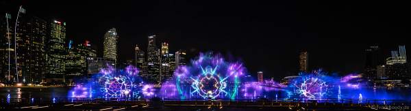 New light and water show SPECTRA with dancing water fountains, water screens and laser at Marina Bay Sands Singapore