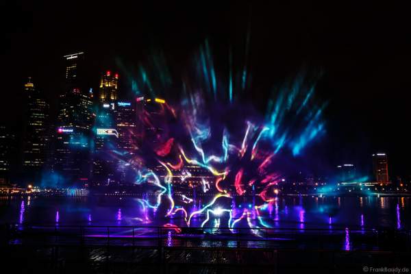New light and water show SPECTRA with dancing water fountains, water screens and laser at Marina Bay Sands Singapore