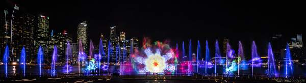 New light and water show SPECTRA with dancing water fountains, water screens and laser at Marina Bay Sands Singapore