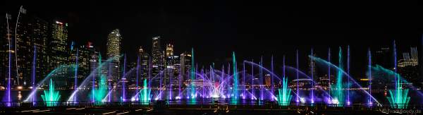 New light and water show SPECTRA with dancing water fountains, water screens and laser at Marina Bay Sands Singapore