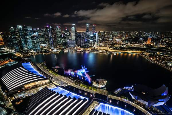 New light and water show SPECTRA with dancing water fountains, water screens and laser at Marina Bay Sands Singapore