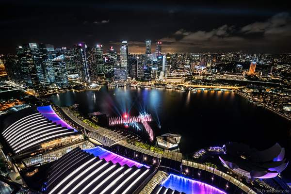 New light and water show SPECTRA with dancing water fountains, water screens and laser at Marina Bay Sands Singapore
