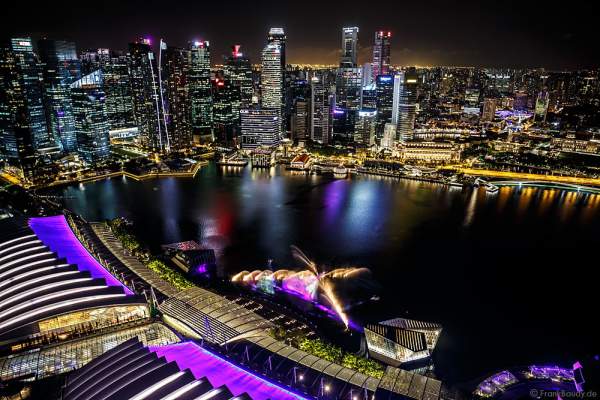 New light and water show SPECTRA with dancing water fountains, water screens and laser at Marina Bay Sands Singapore