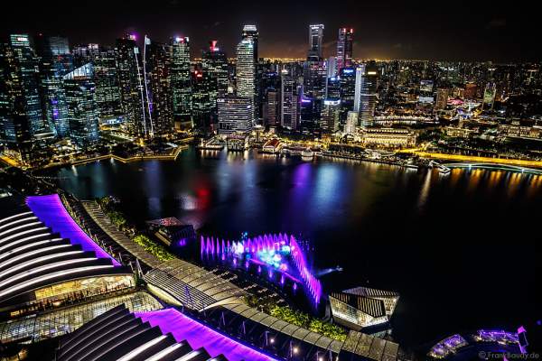 New light and water show SPECTRA with dancing water fountains, water screens and laser at Marina Bay Sands Singapore