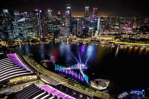 New light and water show SPECTRA with dancing water fountains, water screens and laser at Marina Bay Sands Singapore