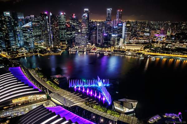 New light and water show SPECTRA with dancing water fountains, water screens and laser at Marina Bay Sands Singapore