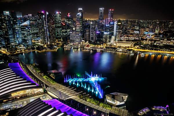 New light and water show SPECTRA with dancing water fountains, water screens and laser at Marina Bay Sands Singapore
