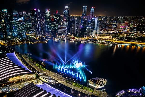 New light and water show SPECTRA with dancing water fountains, water screens and laser at Marina Bay Sands Singapore